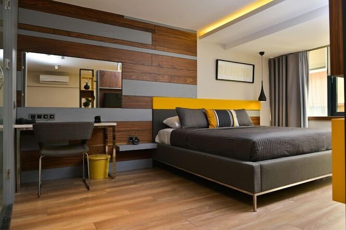 Imagen de la habitación del Spil Suites. Foto 15