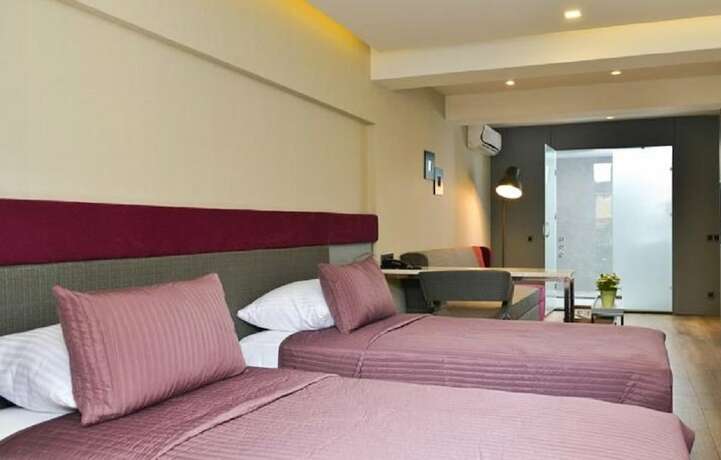 Imagen de la habitación del Spil Suites. Foto 16
