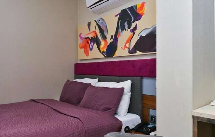 Imagen de la habitación del Spil Suites. Foto 17