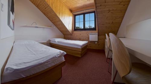 Imagen de la habitación del Sporthotel K&aacute;cov. Foto 6