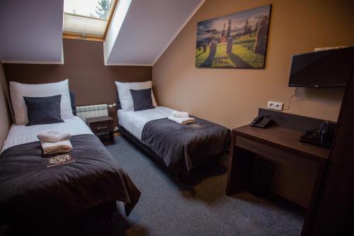 Imagen de la habitación del Srebrny Bucznik Wellness & Restauracja. Foto 9
