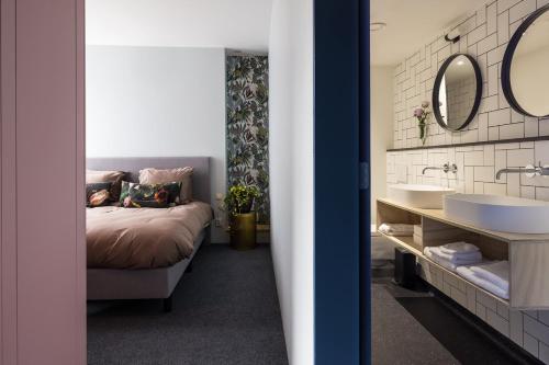 Imagen de la habitación del Stadshotel Steegoversloot. Foto 17