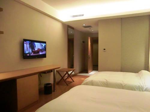 Imagen de la habitación del Starway Hotel Shanghai Songjiang Stadium. Foto 1
