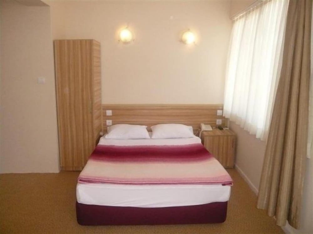 Imagen de la habitación del Status Hotel. Foto 7