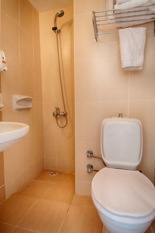 Imagen de la habitación del Status Hotel. Foto 12