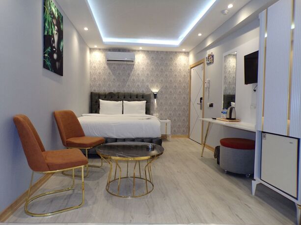 Imagen de la habitación del Stay Suite Hotel. Foto 14