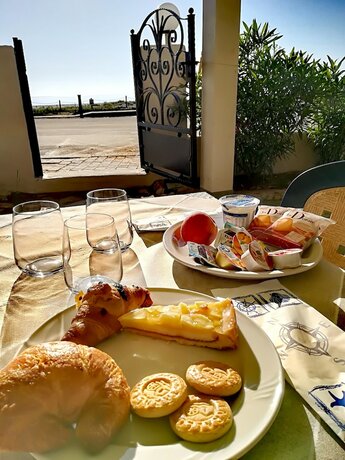 Imagen del bar/restaurante del Stella Marina Camere Sul Mare. Foto 18
