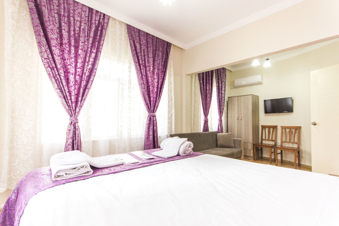 Imagen de la habitación del Stone Garden Apart Hotel. Foto 9