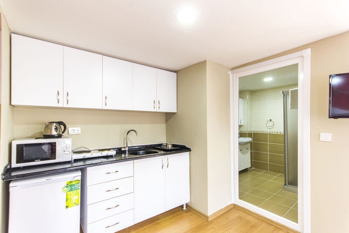 Imagen de la habitación del Stone Garden Apart Hotel. Foto 10