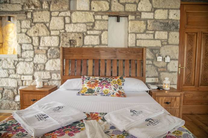 Imagen de la habitación del Stone Garden Tas Hotel. Foto 3