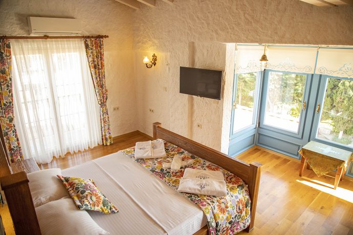 Imagen de la habitación del Stone Garden Tas Hotel. Foto 4