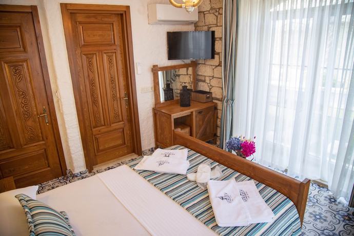 Imagen de la habitación del Stone Garden Tas Hotel. Foto 5