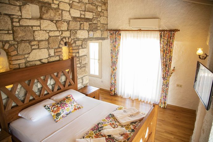 Imagen de la habitación del Stone Garden Tas Hotel. Foto 6