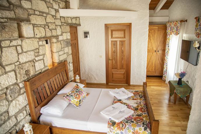 Imagen de la habitación del Stone Garden Tas Hotel. Foto 7