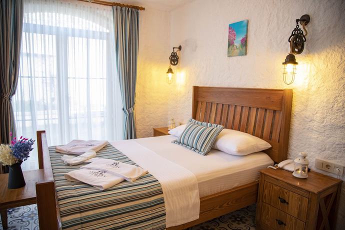 Imagen de la habitación del Stone Garden Tas Hotel. Foto 8