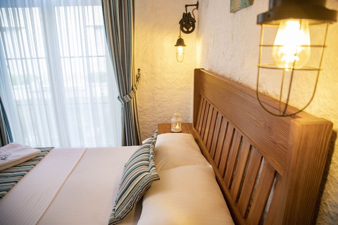 Imagen de la habitación del Stone Garden Tas Hotel. Foto 10