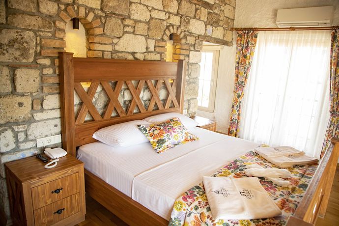 Imagen de la habitación del Stone Garden Tas Hotel. Foto 15