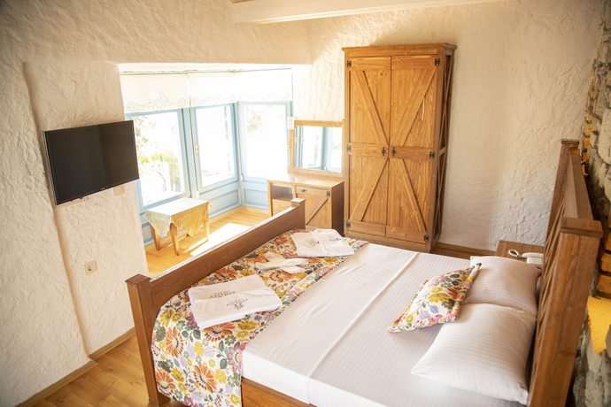 Imagen de la habitación del Stone Garden Tas Hotel. Foto 16