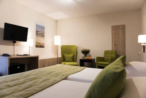 Imagen de la habitación del Strandhotel De Vassy. Foto 5