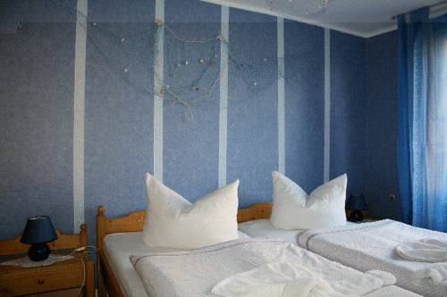 Imagen de la habitación del Strand-hotel Lobbe. Foto 6