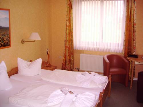 Imagen de la habitación del Strand-hotel Lobbe. Foto 10