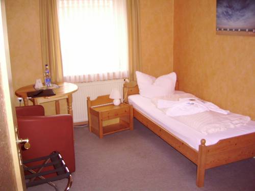 Imagen de la habitación del Strand-hotel Lobbe. Foto 11