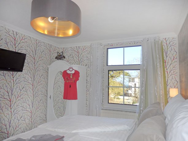 Imagen de la habitación del Strandhotel Villa Louisa and Appartementh&auml;user Villa Josephine und Christine. Foto 7