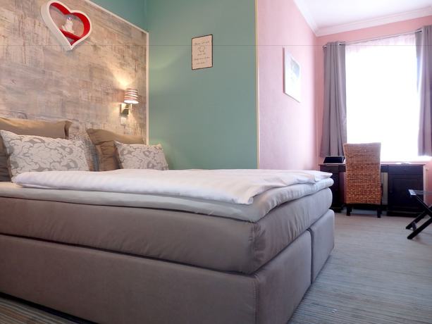 Imagen de la habitación del Strandhotel Villa Louisa and Appartementh&auml;user Villa Josephine und Christine. Foto 8