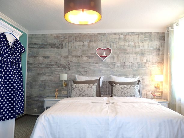 Imagen de la habitación del Strandhotel Villa Louisa and Appartementh&auml;user Villa Josephine und Christine. Foto 9