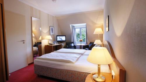 Imagen de la habitación del Strandhotel garni Kormoran. Foto 9