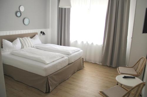 Imagen de la habitación del Strandhuus Norddeich. Foto 5