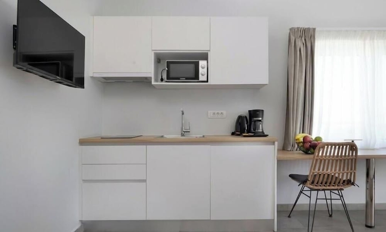 Imagen de la habitación del Sueno Studios and Apartments. Foto 15
