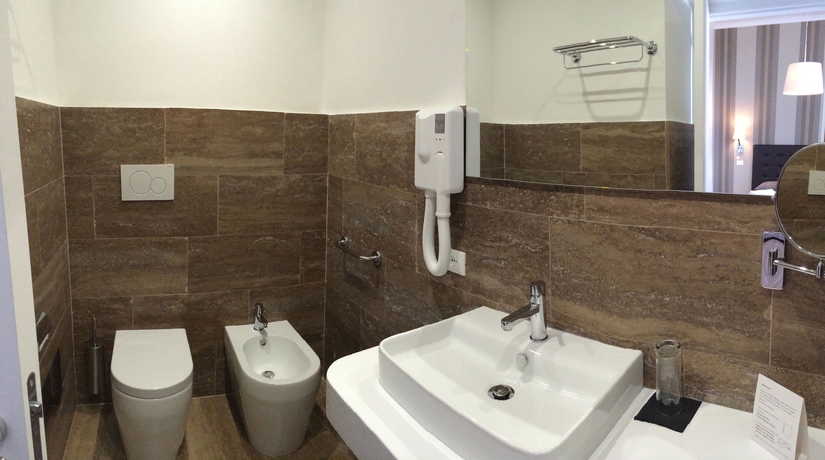 Imagen de la habitación del Suite Deal Rome. Foto 8