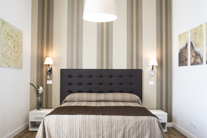 Imagen de la habitación del Suite Deal Rome. Foto 9