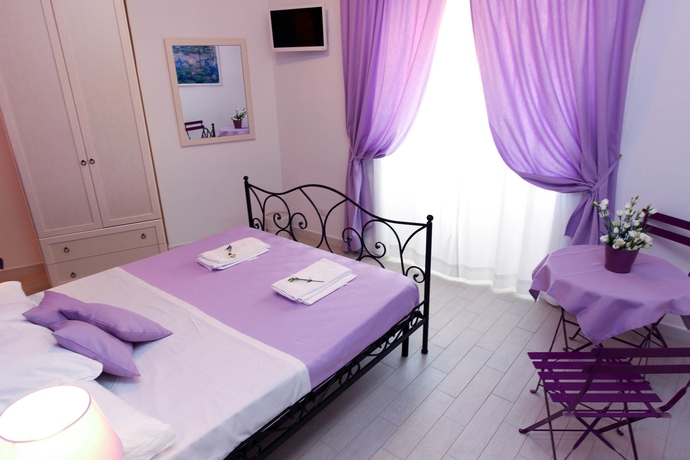 Imagen de la habitación del Suite Rome. Foto 6
