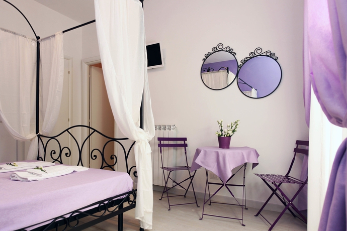 Imagen de la habitación del Suite Rome. Foto 9