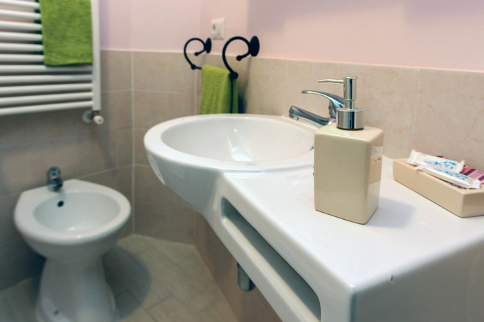Imagen de la habitación del Suite Rome. Foto 11