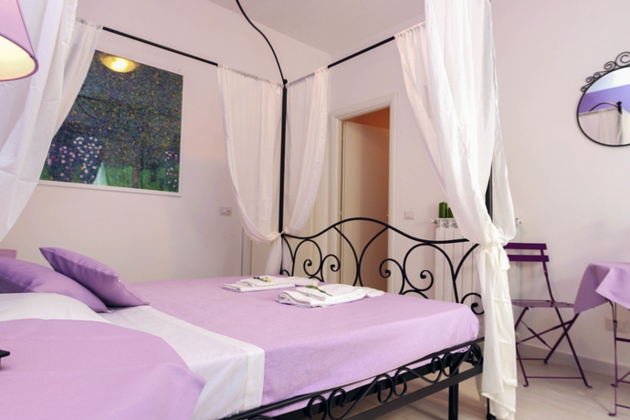 Imagen de la habitación del Suite Rome. Foto 13