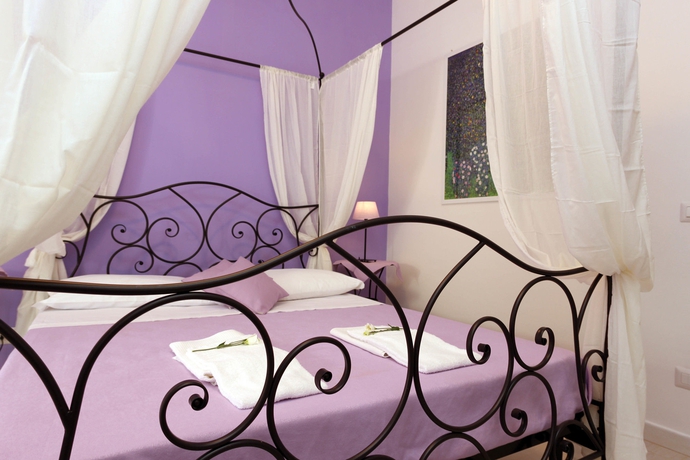 Imagen de la habitación del Suite Rome. Foto 15