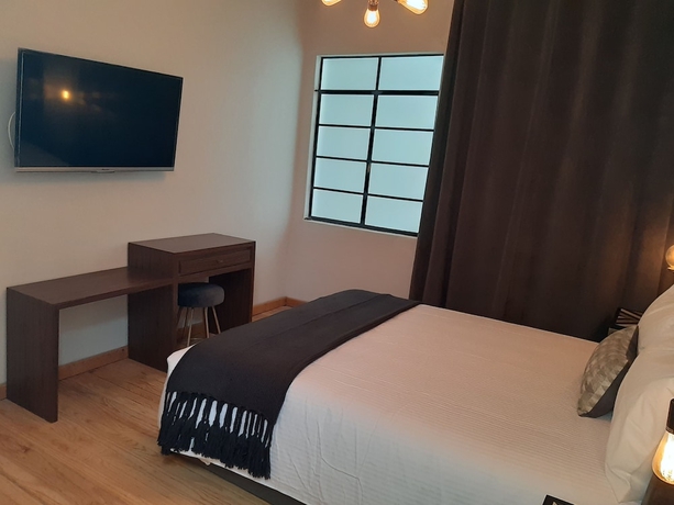 Imagen de la habitación del Suites Alcazar. Foto 10