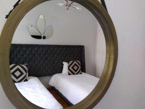 Imagen de la habitación del Suites Alcazar. Foto 13