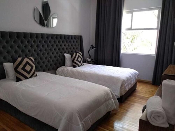 Imagen de la habitación del Suites Alcazar. Foto 14
