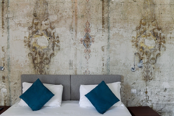 Imagen de la habitación del Suites Farnese Design. Foto 10