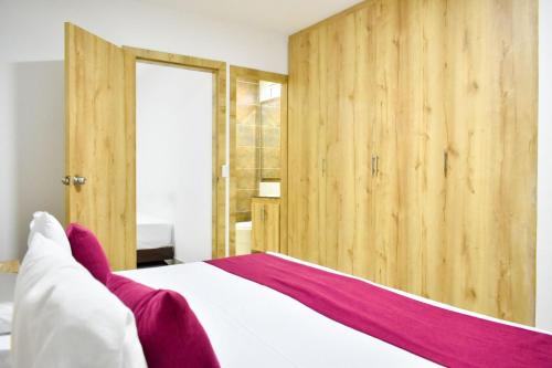 Imagen de la habitación del Suites Flora Deluxe Av 5. Foto 19