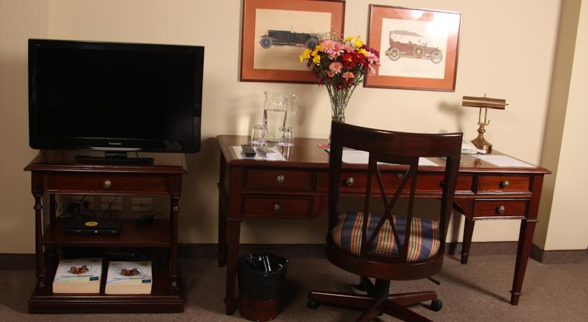 Imagen de la habitación del Suites Plaza Las Flores Aparthotel. Foto 2