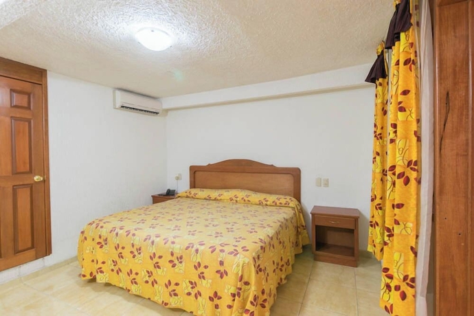 Imagen de la habitación del Suites Poliforum Inn, Le&oacute;n. Foto 12
