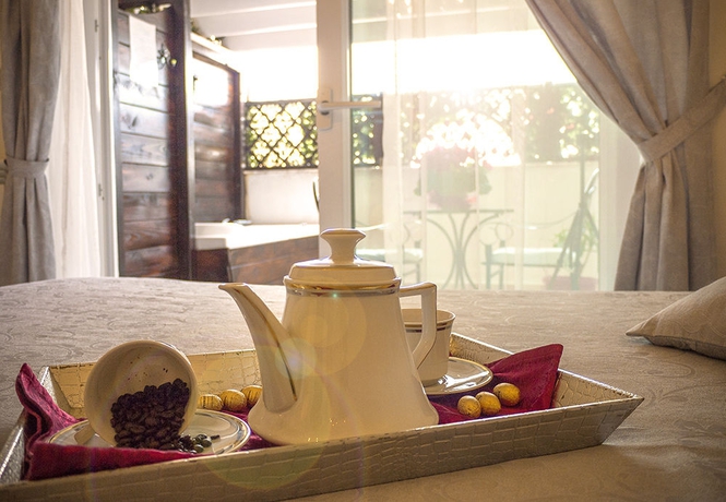 Imagen de la habitación del Suites Roma Tiburtina. Foto 9