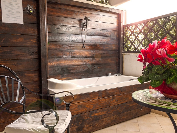 Imagen de la habitación del Suites Roma Tiburtina. Foto 11