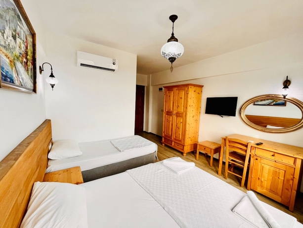 Imagen de la habitación del Sukha Inn Otel and Beach. Foto 3