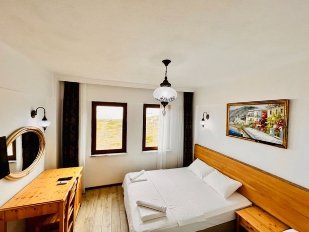 Imagen de la habitación del Sukha Inn Otel and Beach. Foto 4